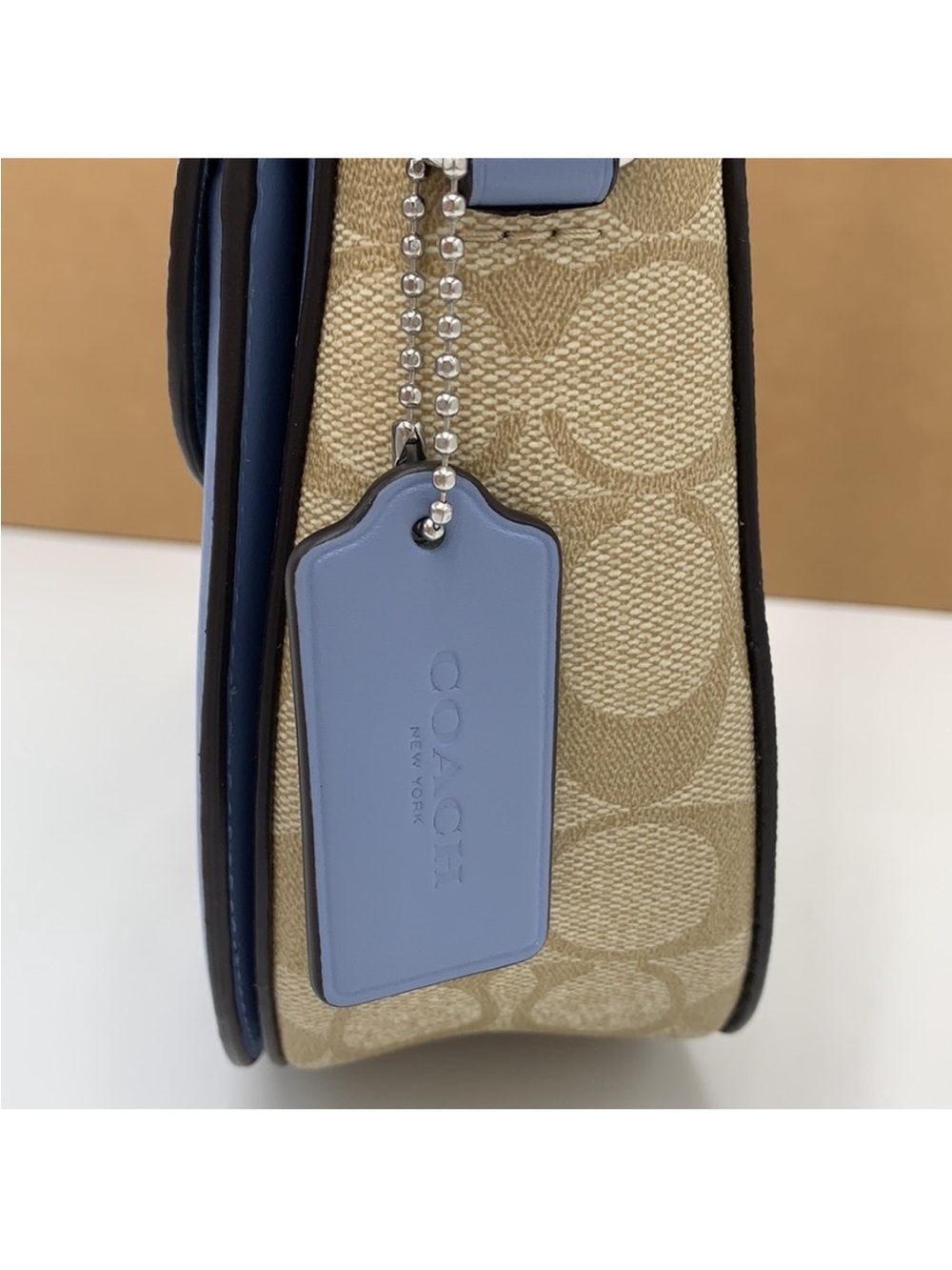 COACH Georgie Saddle Bag In Signat Canvas COLOR:
Silver/Light Khaki/Marble
Blue - Picture 7 of 16